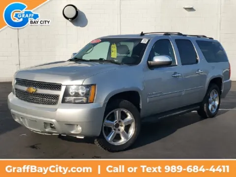 Silver 2013 Chevrolet Suburban 1500 LTZ for sale in Bay City, MI
