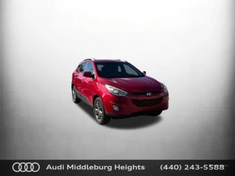 Red 2014 Hyundai Tucson SE for sale in Middleburg Heights, OH