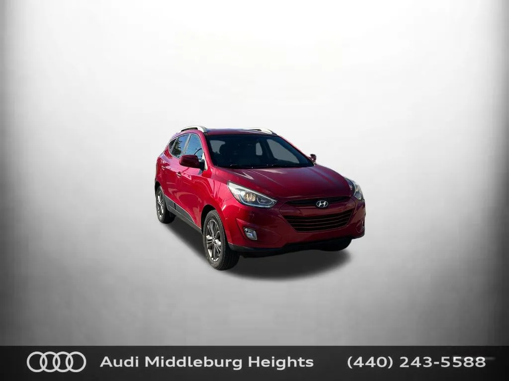 Red 2014 Hyundai Tucson SE for sale in Middleburg Heights, OH