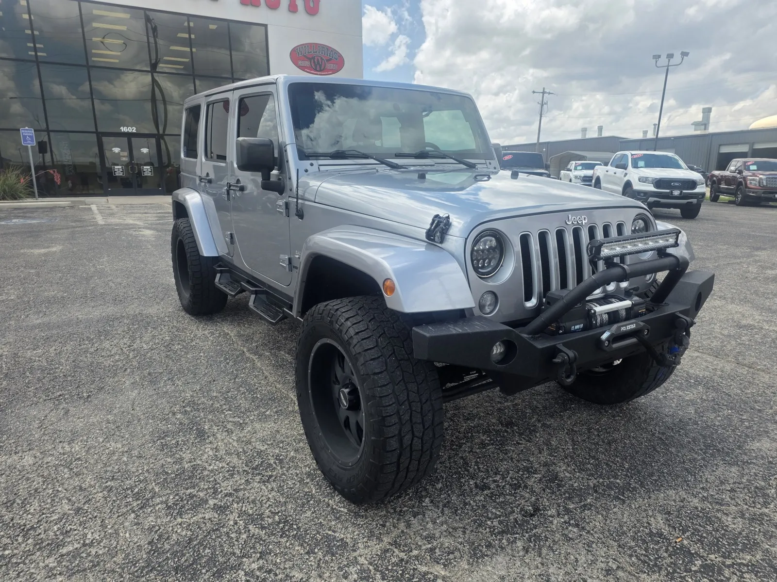 Silver 2016 JEEP WRANGLER UNLIMI SAHARA for sale in Abilene, TX