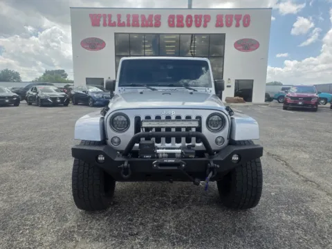 Photos of 2016 JEEP WRANGLER UNLIMI SAHARA for sale in Abilene, TX at Williams Group Auto