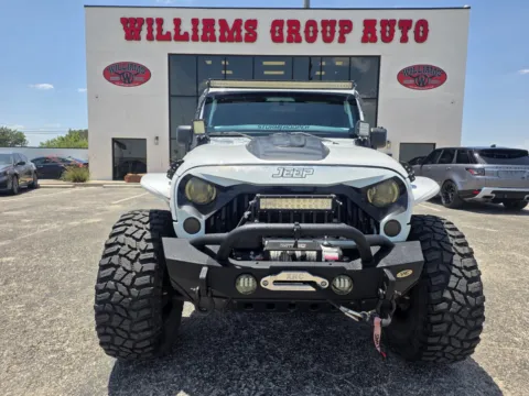 Photos of 2012 JEEP WRANGLER UNLIMI SPORT for sale in Abilene, TX at Williams Group Auto