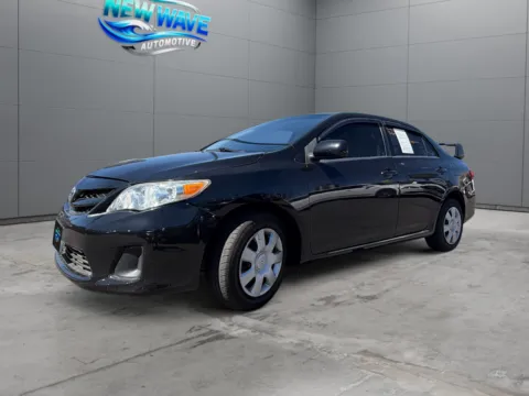 Black 2011 Toyota Corolla LE for sale in Denver, CO