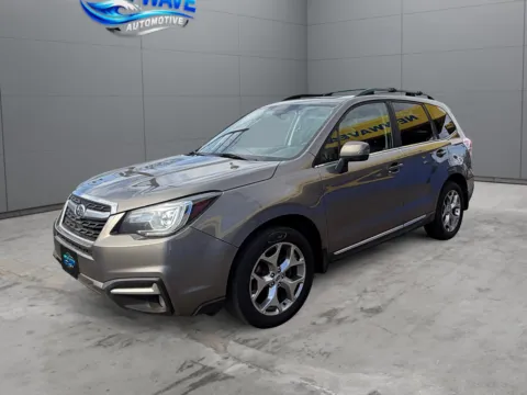 Brown 2017 Subaru Forester 2.5i Touring for sale in Denver, CO