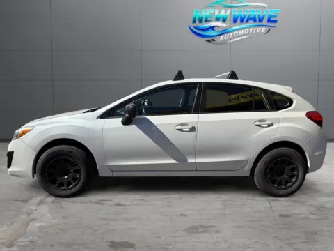 Photos of 2014 Subaru Impreza 2.0i for sale in Denver, CO at New Wave Automotive