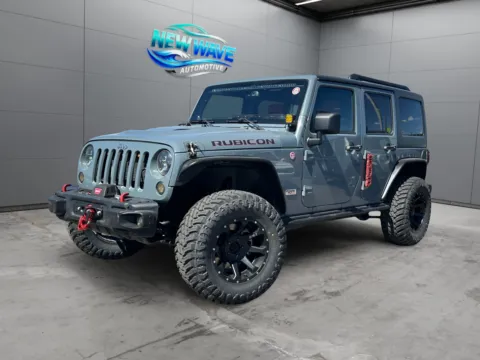 Silver 2013 Jeep Wrangler Unlimited Rubicon 10th Anniversary for sale in Denver, CO