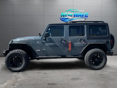 Photos of 2013 Jeep Wrangler Unlimited Rubicon 10th Anniversary for sale in Denver, CO at New Wave Automotive