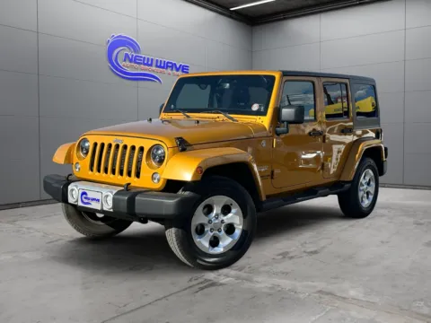 Gray 2014 Jeep Wrangler Unlimited Sahara for sale in Denver, CO