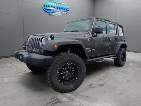 Gray 2014 Jeep Wrangler Unlimited Sport for sale in Denver, CO