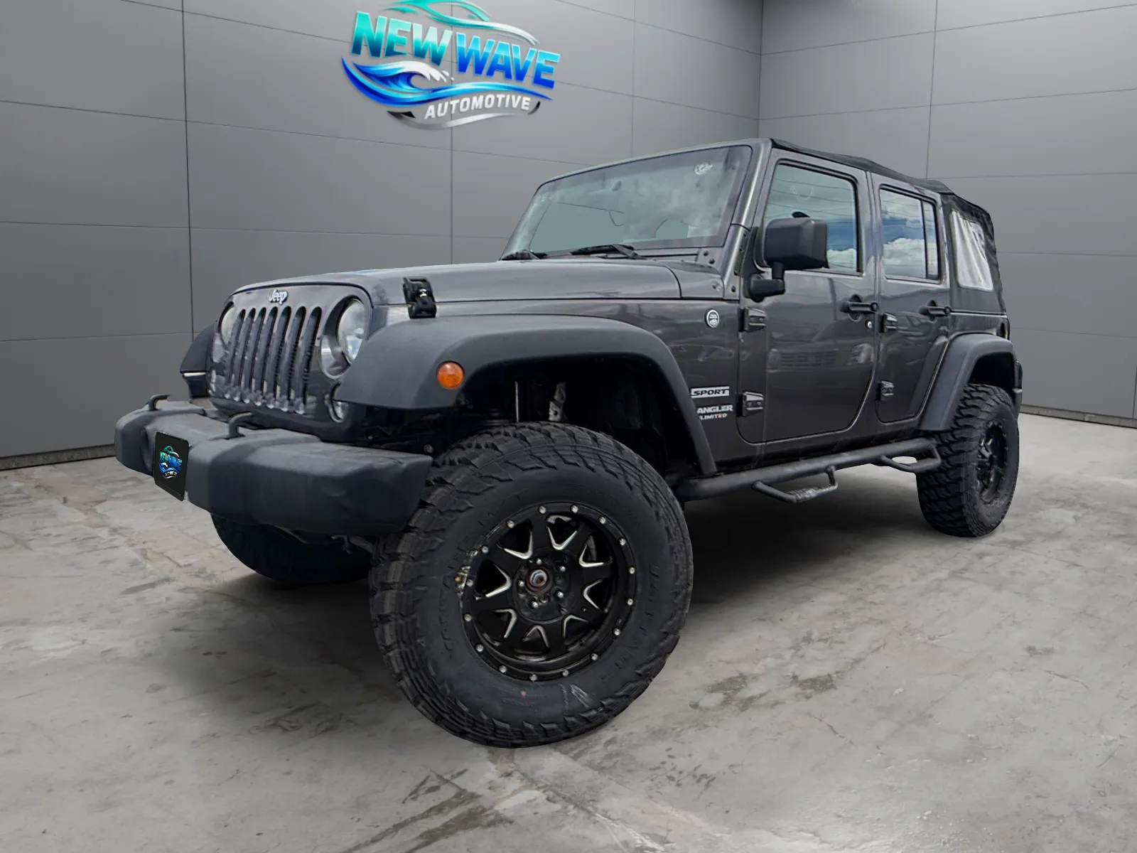 Gray 2014 Jeep Wrangler Unlimited Sport for sale in Denver, CO