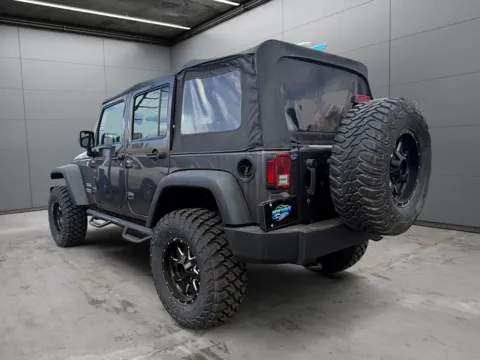 Another view of 2014 JEEP WRANGLER UNLIMITED Sport for sale in Denver, CO at New Wave Automotive