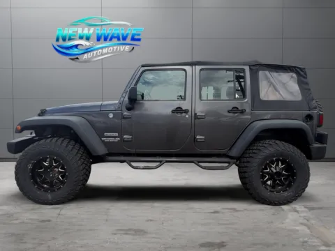 Photos of 2014 Jeep Wrangler Unlimited Sport for sale in Denver, CO at New Wave Automotive
