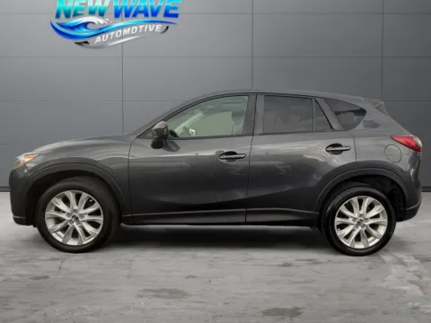 Photos of 2014 Mazda CX-5 Grand Touring for sale in Denver, CO at New Wave Automotive