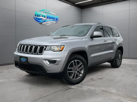 Silver 2020 Jeep Grand Cherokee Laredo E 4x4 for sale in Denver, CO