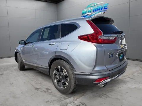 Another view of 2017 Honda CR-V Touring for sale in Denver, CO at New Wave Automotive