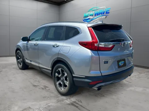Another view of 2017 Honda CR-V Touring for sale in Denver, CO at New Wave Automotive