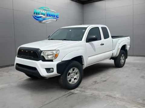 White 2012 Toyota Tacoma PreRunner V6 for sale in Denver, CO