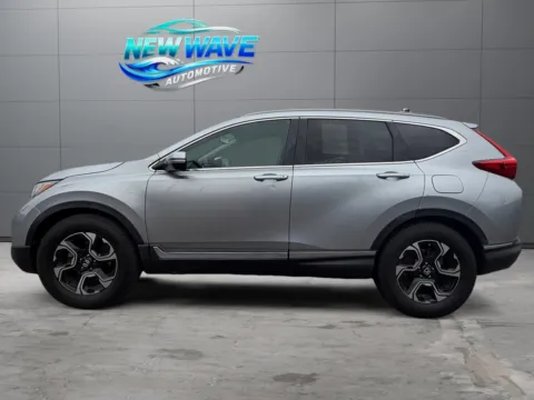 Photos of 2015 Nissan Rogue Select S for sale in Denver, CO at New Wave Automotive