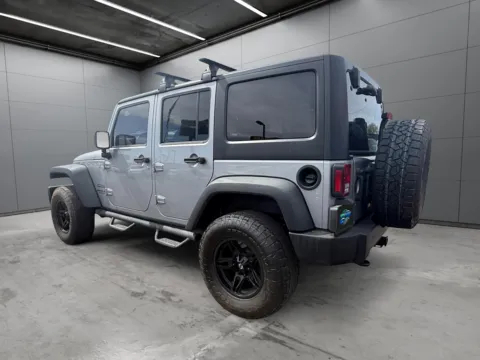 Another view of 2013 JEEP WRANGLER UNLIMITED Sport for sale in Denver, CO at New Wave Automotive