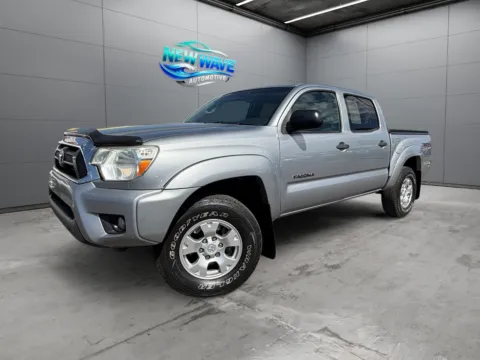 Silver 2014 Toyota Tacoma Base V6 for sale in Denver, CO