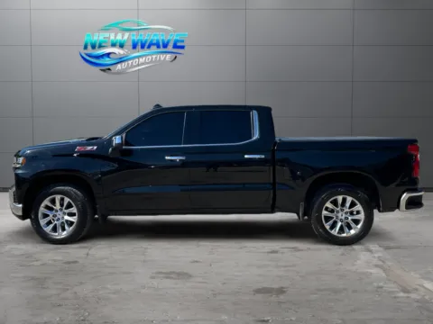 Photos of 2021 Chevrolet Silverado 1500 4WD Crew Cab Short Bed LTZ for sale in Denver, CO at New Wave Automotive