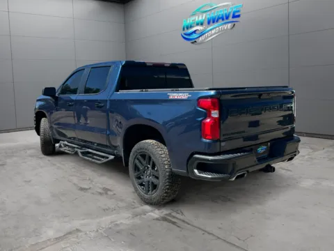 Another view of 2021 Chevrolet Silverado 1500 4WD Crew Cab Short Bed LT Trail Boss for sale in Denver, CO at New Wave Automotive
