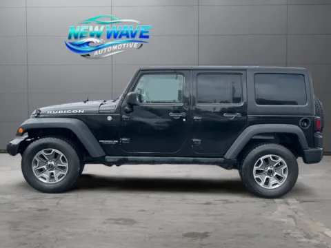 Photos of 2014 Jeep Wrangler Unlimited Rubicon for sale in Denver, CO at New Wave Automotive