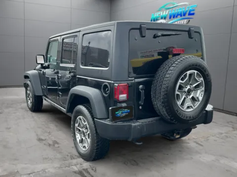 Another view of 2014 Jeep Wrangler Unlimited Rubicon for sale in Denver, CO at New Wave Automotive