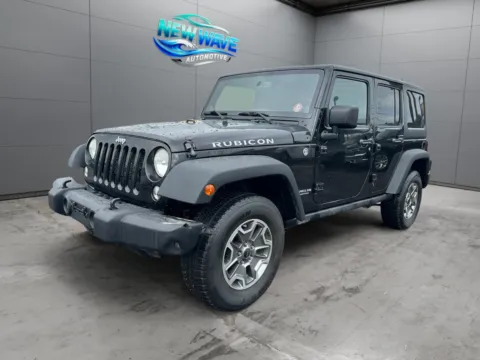 Black 2014 Jeep Wrangler Unlimited Rubicon for sale in Denver, CO