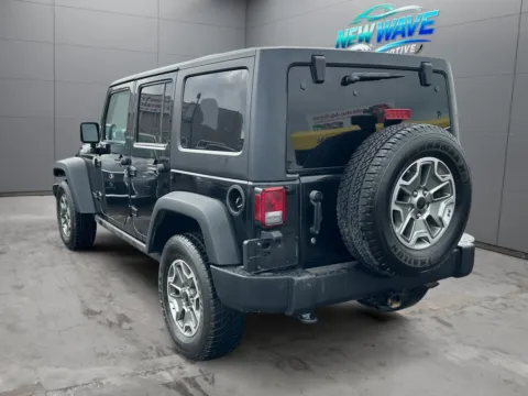Another view of 2014 Jeep Wrangler Unlimited Rubicon for sale in Denver, CO at New Wave Automotive