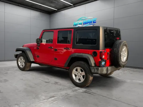 Another view of 2015 Jeep Wrangler Unlimited Sport for sale in Denver, CO at New Wave Automotive