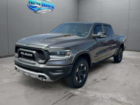 Silver 2019 Ram 1500 Rebel Crew Cab 4x4 5'7" Box for sale in Denver, CO