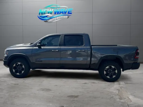 Photos of 2019 Ram 1500 Rebel Crew Cab 4x4 5'7" Box for sale in Denver, CO at New Wave Automotive
