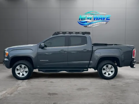 Photos of 2017 GMC Canyon 4WD SLE for sale in Denver, CO at New Wave Automotive