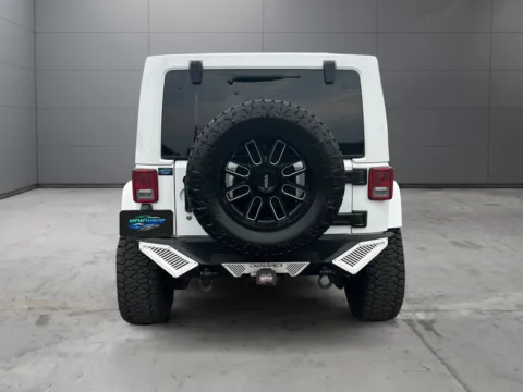 More photos of 2014 Jeep Wrangler Unlimited Altitude at New Wave Automotive, CO