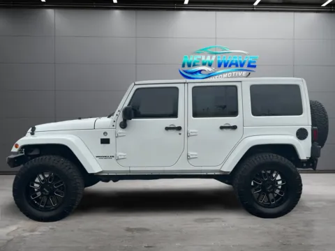 Photos of 2014 Jeep Wrangler Unlimited Altitude for sale in Denver, CO at New Wave Automotive