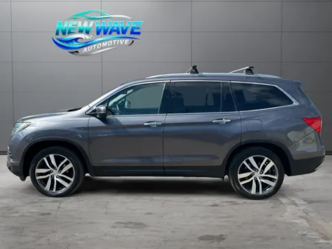 Photos of 2017 Honda Pilot Touring for sale in Denver, CO at New Wave Automotive