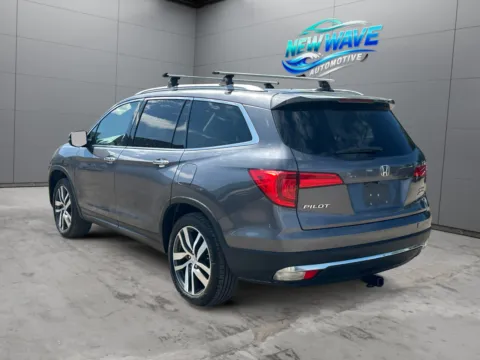 Another view of 2017 Honda Pilot Touring for sale in Denver, CO at New Wave Automotive