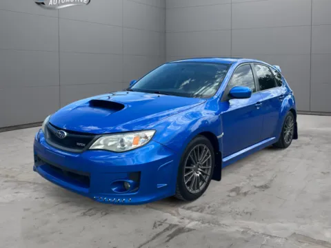 Blue 2014 Subaru Impreza WRX for sale in Denver, CO