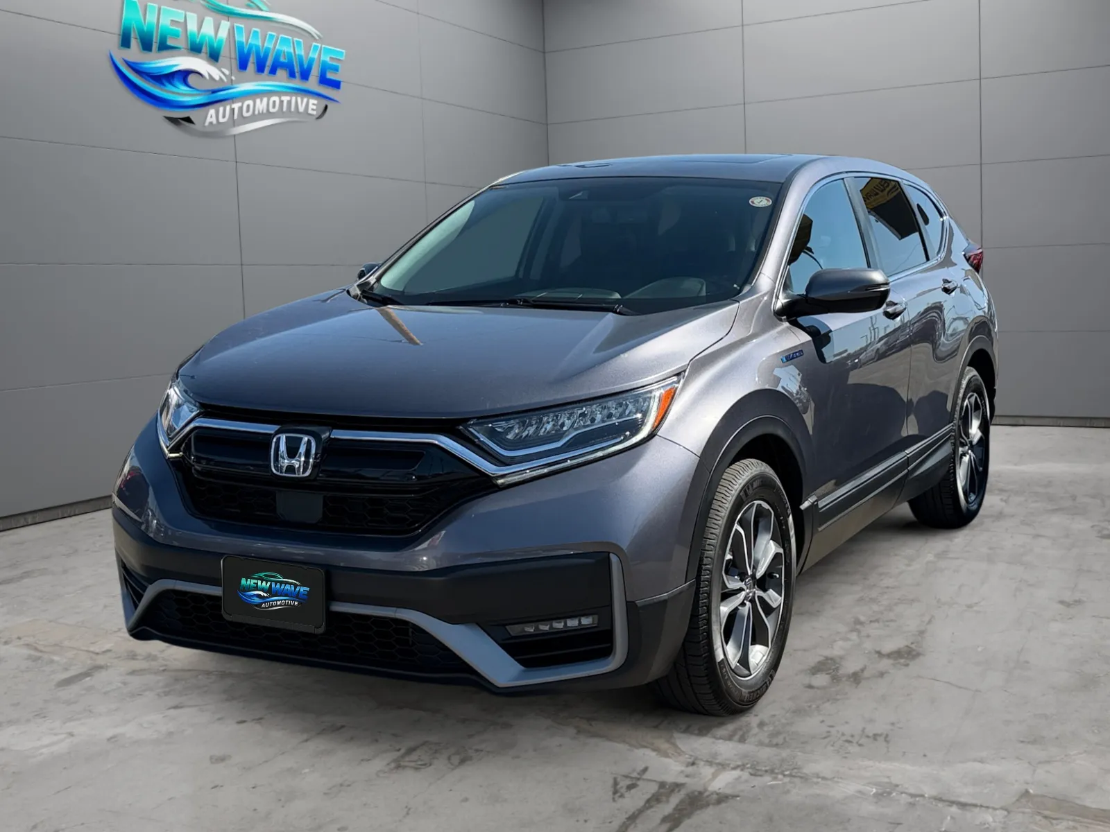 Silver 2022 Honda CR-V Hybrid EX-L for sale in Denver, CO