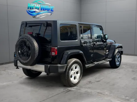 More photos of 2015 Jeep Wrangler Unlimited Sahara at New Wave Automotive, CO