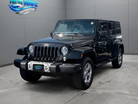 Black 2015 Jeep Wrangler Unlimited Sahara for sale in Denver, CO