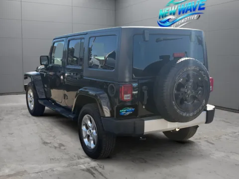 Another view of 2015 Jeep Wrangler Unlimited Sahara for sale in Denver, CO at New Wave Automotive