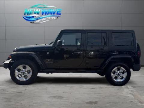 Photos of 2015 Jeep Wrangler Unlimited Sahara for sale in Denver, CO at New Wave Automotive