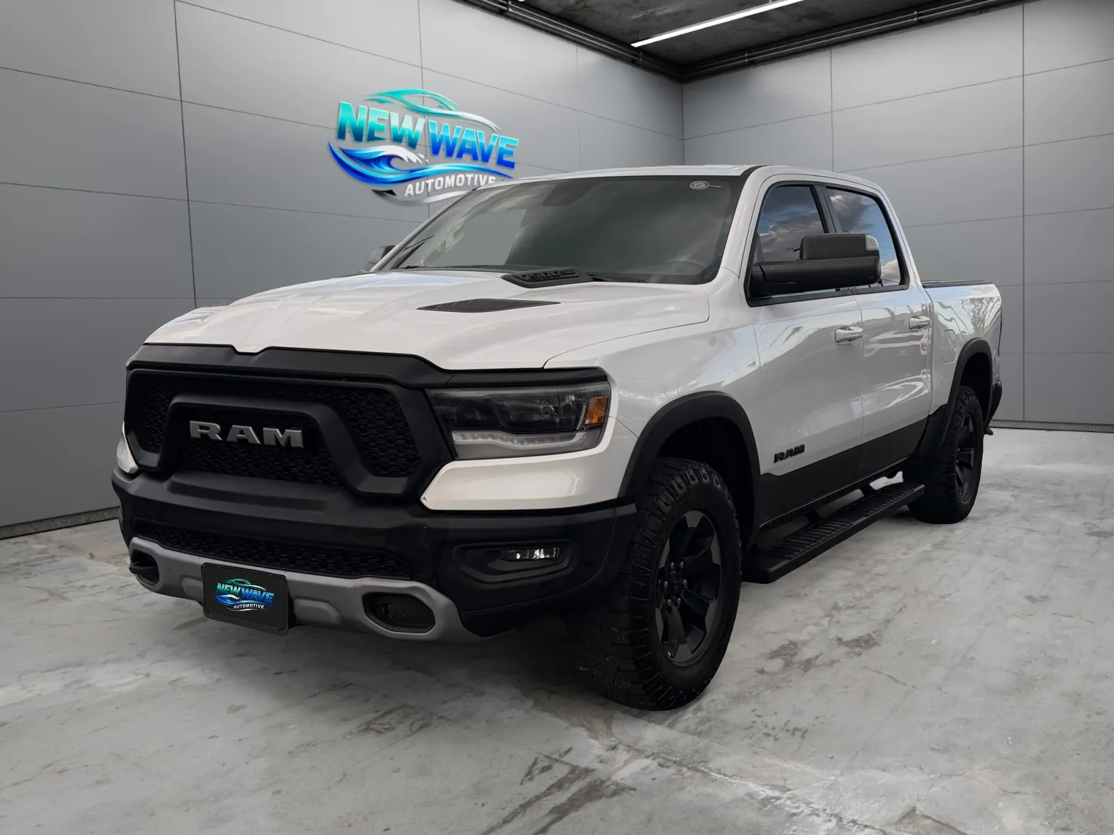 White 2019 Ram 1500 Rebel Crew Cab 4x4 5'7" Box for sale in Denver, CO