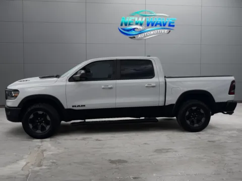 Photos of 2019 Ram 1500 Rebel Crew Cab 4x4 5'7" Box for sale in Denver, CO at New Wave Automotive