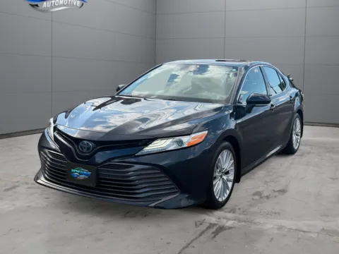 Blue 2020 Toyota Camry Hybrid XLE for sale in Denver, CO