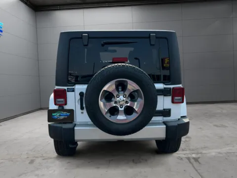 More photos of 2018 Jeep Wrangler JK Unlimite Sahara 4x4 at New Wave Automotive, CO