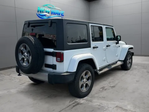 More photos of 2018 Jeep Wrangler JK Unlimite Sahara 4x4 at New Wave Automotive, CO