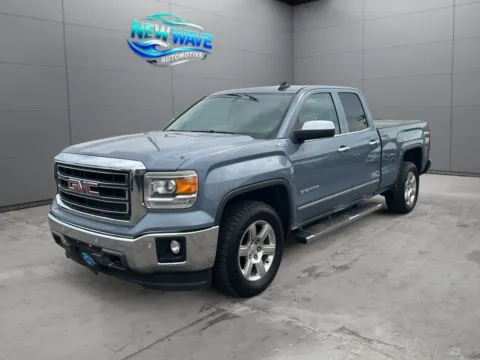 Silver 2015 GMC Sierra 1500 SLT for sale in Denver, CO